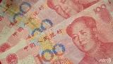 Chinese yuan notes. (AFP/Peter Parks)